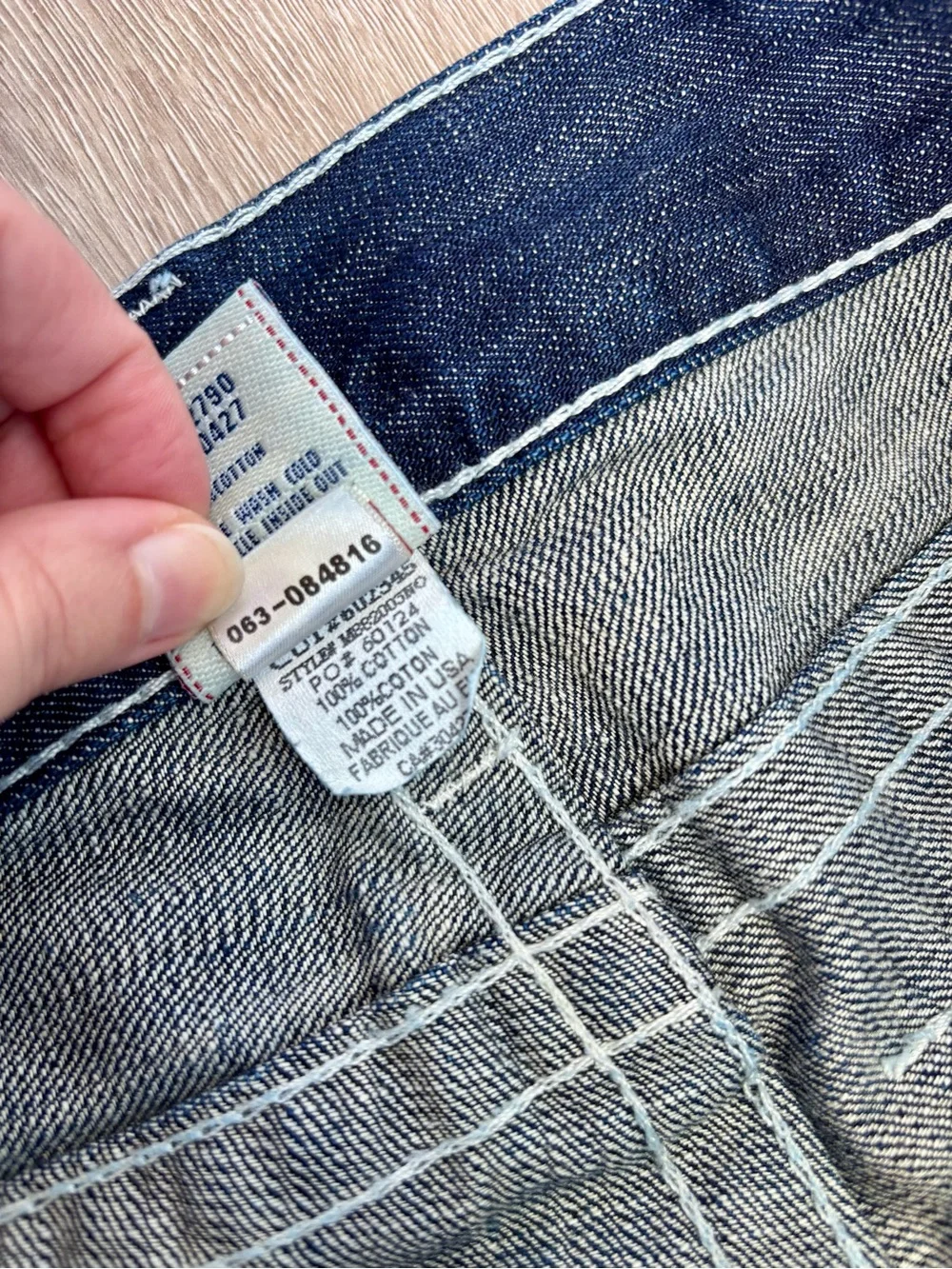 Vintage made in USA True Religion men’s dark blue bootcut jeans, leather accent